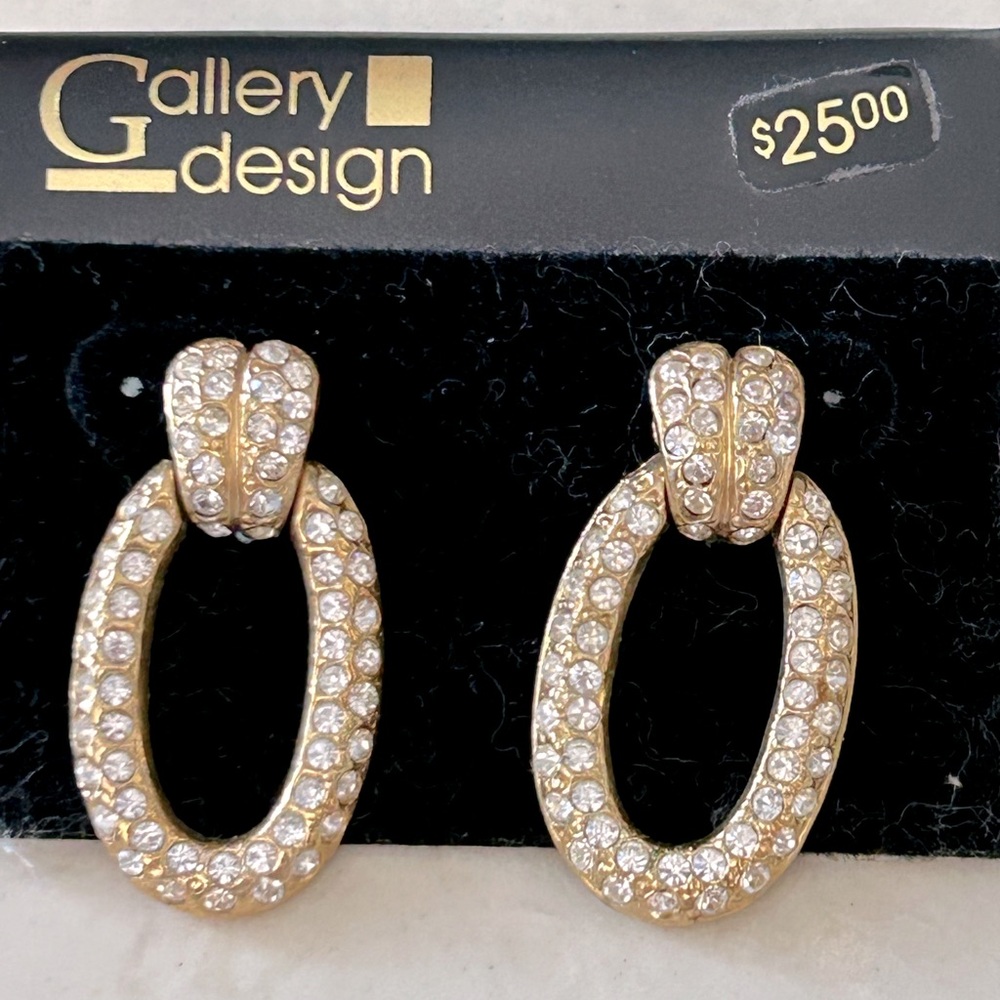Vintage Gallery Design gold and diamond (costume) dangle earrings.